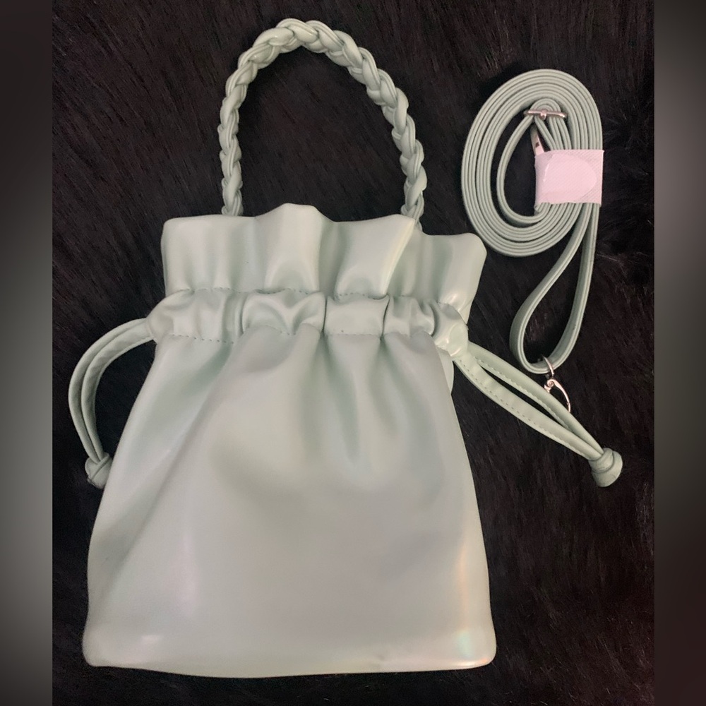 EUC pleated bucket drawstring mint green purse with crossbody strap